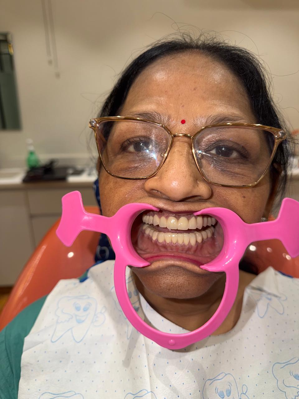 Patient smile after treatment at Ritual Dentistry